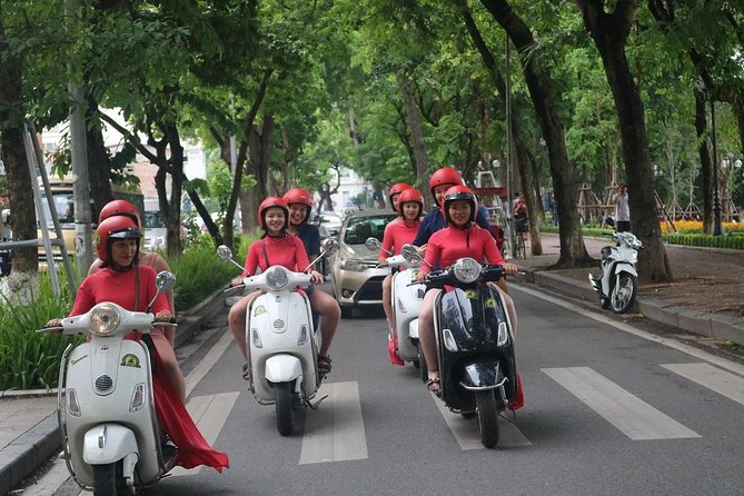 Vespa City Tour + Train Street Female Ao Dai Riders 4,5 Hours - Common questions