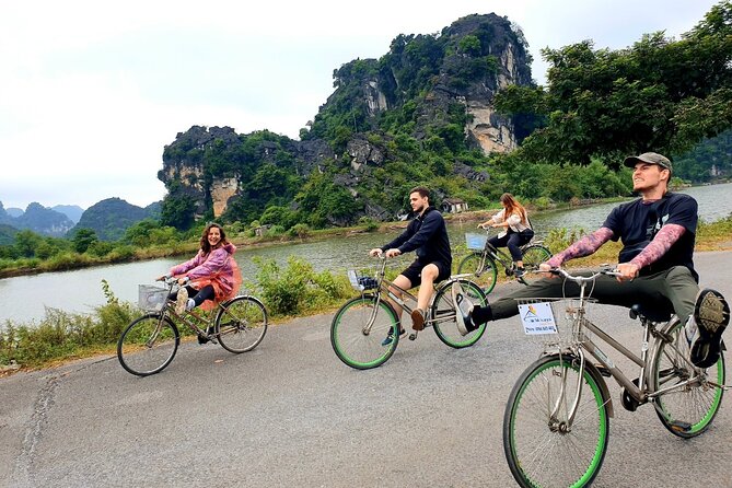 Highlight Ninh Binh Full Day Tour Tam Coc Boat, Mua Cave, Hoa Lu - Professional English Speaking Guide