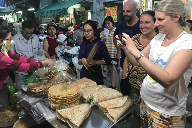 The Unique Ao Dai Street Food Tour By Scooter - Local Landmarks